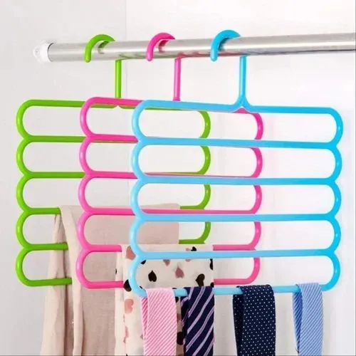 Wire hanger stretching a sweater compared to a wooden hanger